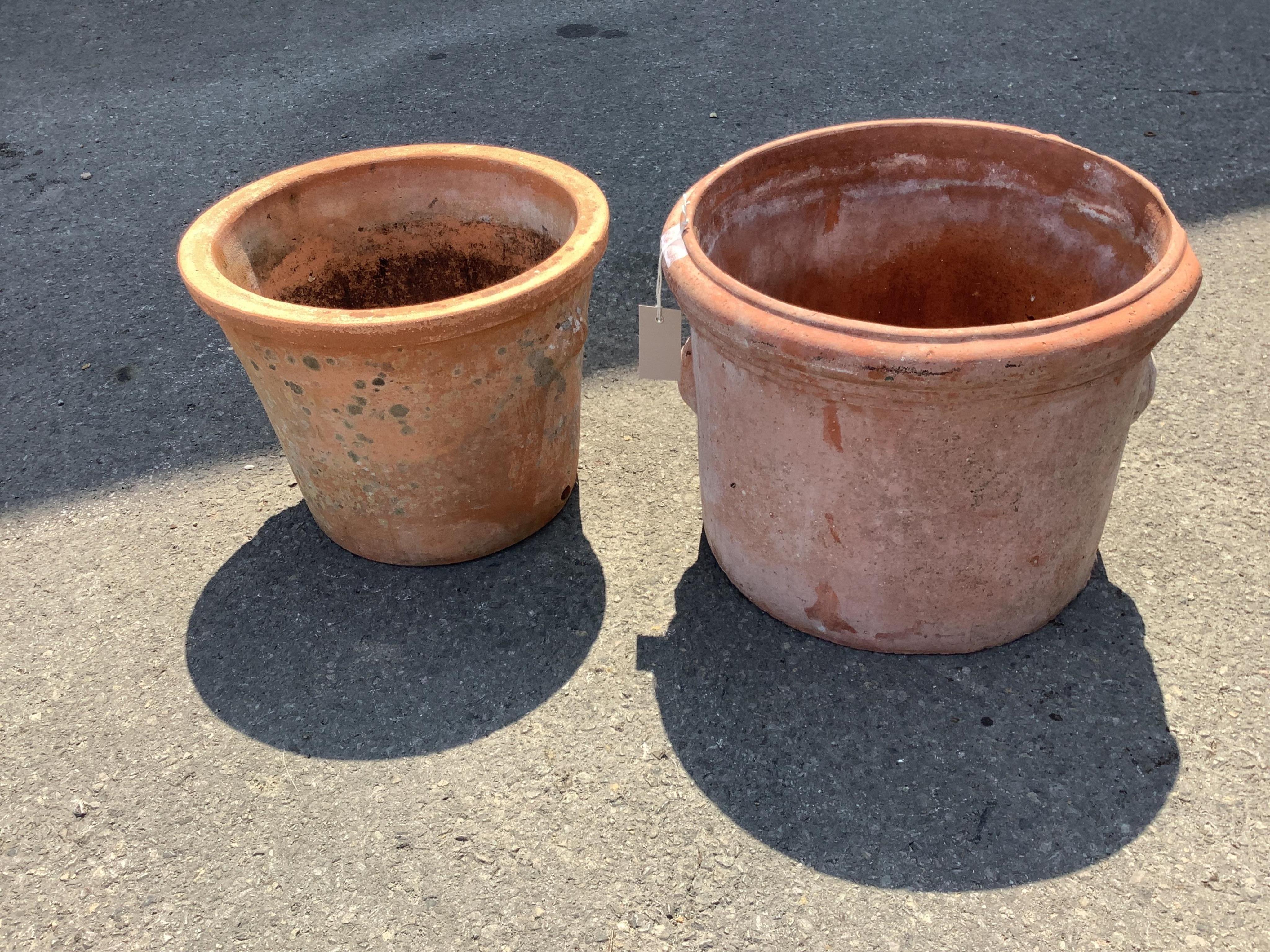 Two circular terracotta garden planters, larger diameter 40cm, height 31cm. Condition - fair